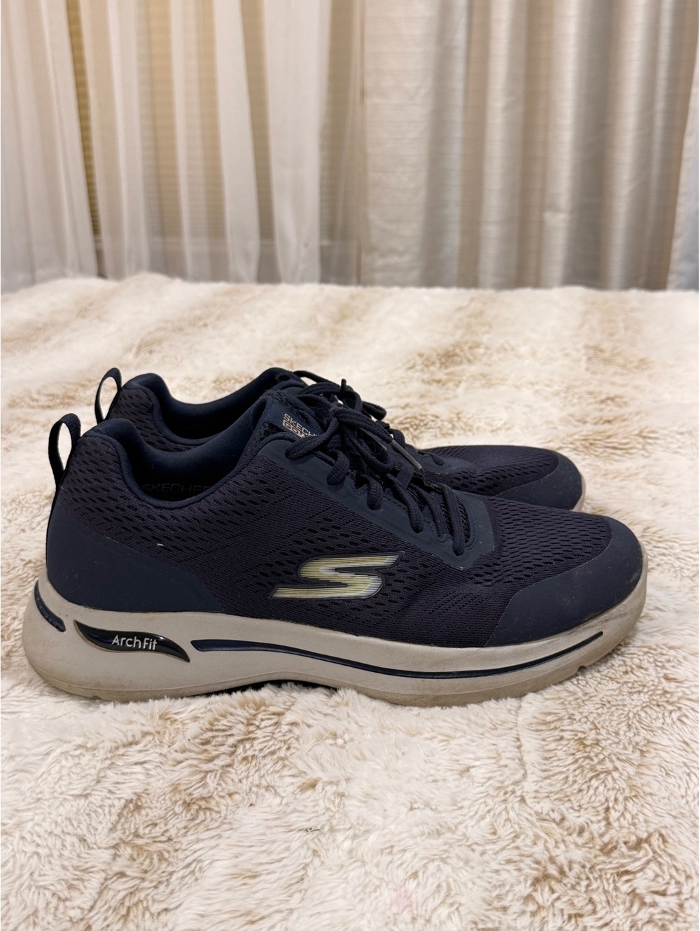Skechers navy lace-up sneakers